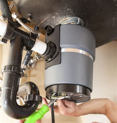 garbage disposal leaking from bottom|How to Fix a Garbage Disposal